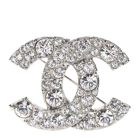 chanel cut-off rhinestone embellished cc brooch|Chanel costume jewelry.